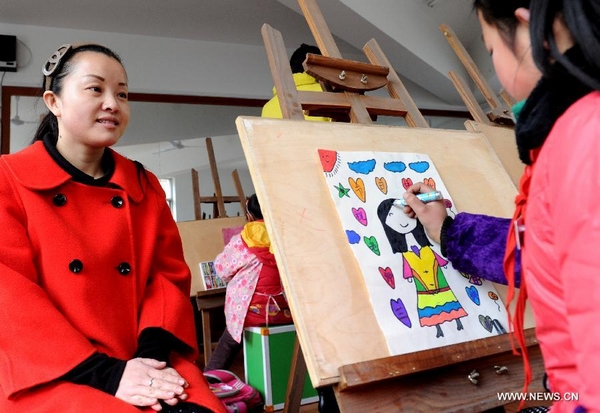 Stay-at-home kids paint portraits for teachers