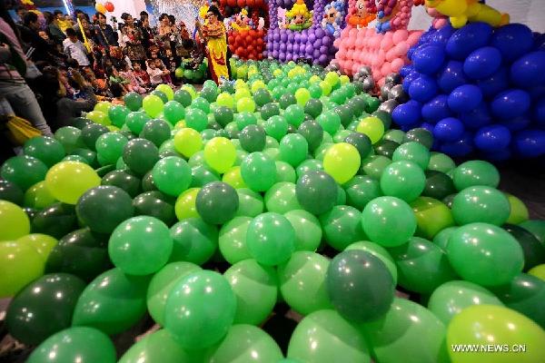 Children play at Balloon Carnival in Hefei